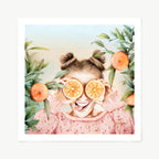 Art print Ola a Lady holding orange slices over eyes with green leaves and oranges on a light blue background