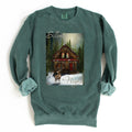 Blue spruce colored sweatshirt with my artwork of a cabin and deer with 'Silent Night' text added to the design. 