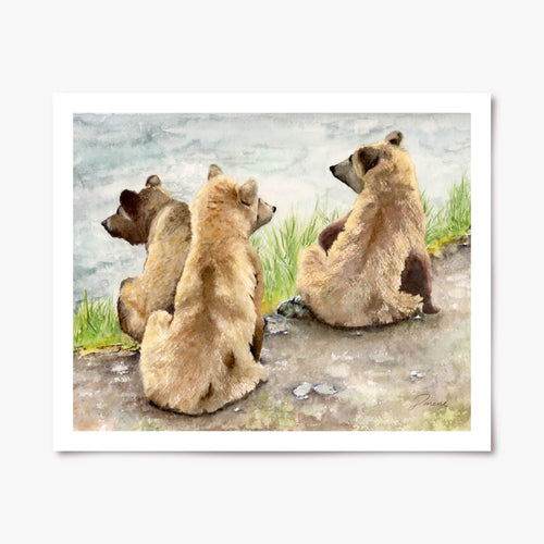 Art print of three bear cubs sitting side by side with their backs towards the viewer, looking out over a body of water.